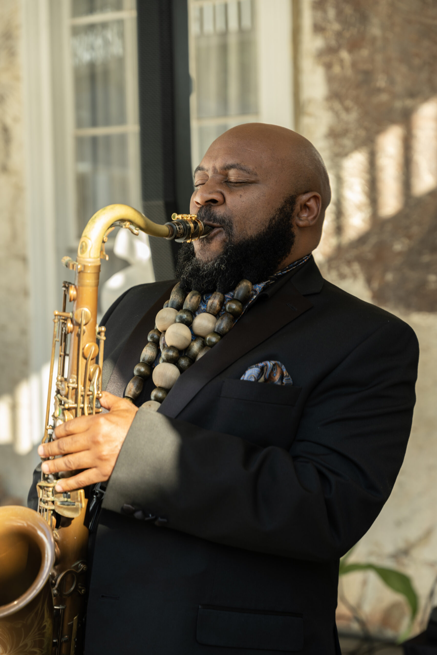 Live saxophonist performing elegant music at an upscale event